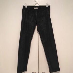 Graphic black leggings with painted on design.